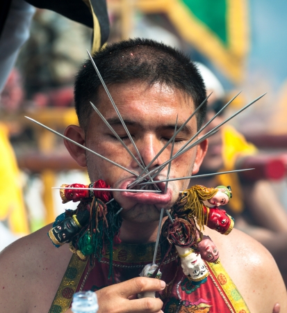 PHUKET, THAILAND- OCT 23: Unidentified participant the parade on October 23, 2012 Vegetarian Festival Phuket Thailand. The Festival is a famous annual festival also known as Nine Emperor Gods festivalのeditorial素材