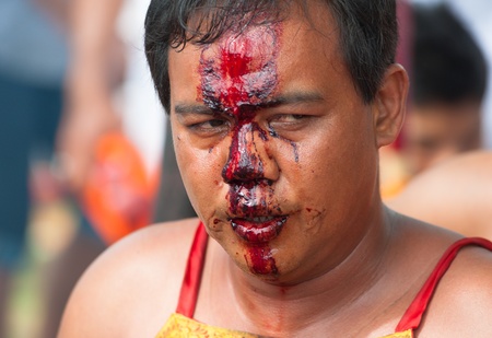 PHUKET, THAILAND- OCT 23: Unidentified participant the parade on October 23, 2012 Vegetarian Festival Phuket Thailand. The Festival is a famous annual festival also known as Nine Emperor Gods festivalのeditorial素材