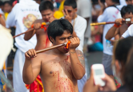 PHUKET, THAILAND- OCT 23: Unidentified participant the parade on October 23, 2012 Vegetarian...