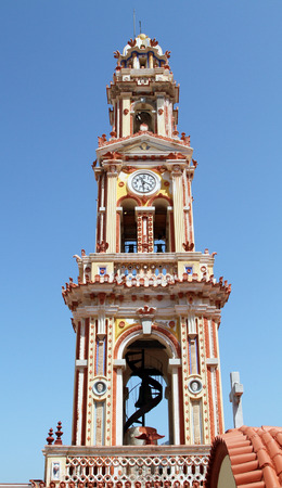 Belltower Monastery  Panoramitis (St. Mikhail) on the Greek island of Simiの写真素材