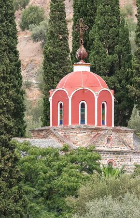 Dome of the old church on Mount Athos looking out of the green. Greeceの写真素材