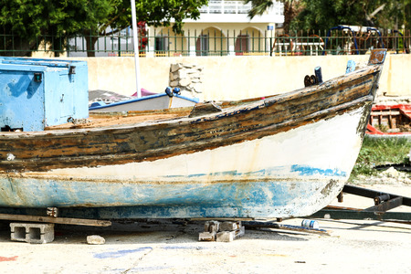 Fishing boat in repair on the coast. Greeceの写真素材