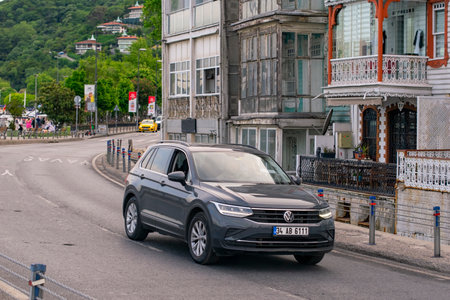 Istanbul, Turkey - May 2022: Black Volkswagen Tiguan at the city street in motion. Black Volkswagen Tiguan car moving on the streetのeditorial素材