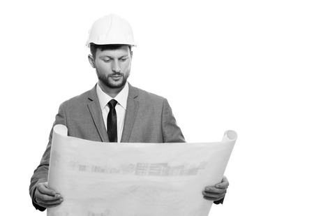 Mature male architect with a blueprintの写真素材