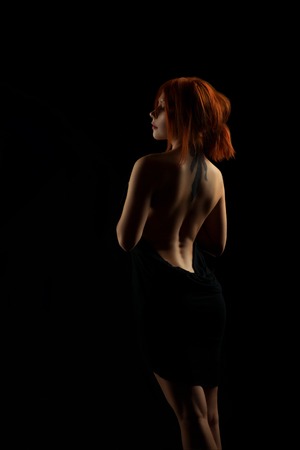 Beautiful redhead woman in studioの写真素材