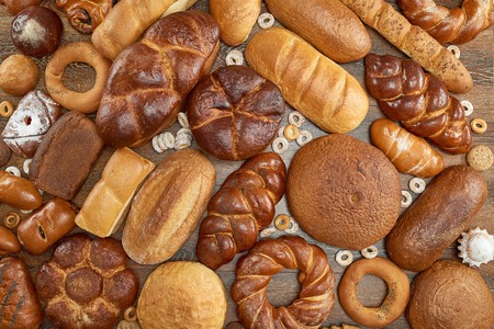 Assorted breads isolated on whiteの写真素材