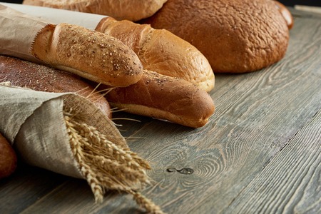 Assorted breads isolated on whiteの写真素材