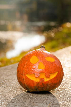 Carved pumpkin with a smiling faceの写真素材