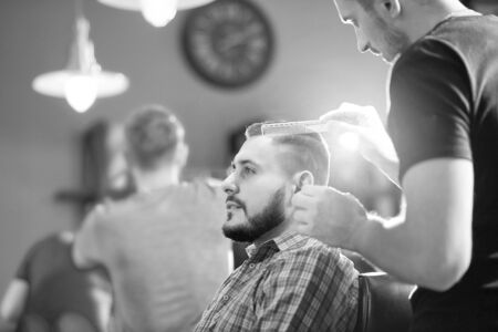 Young man at the barbershop