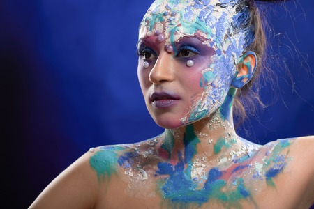Beatiful girl with bright, fantastic make-up.