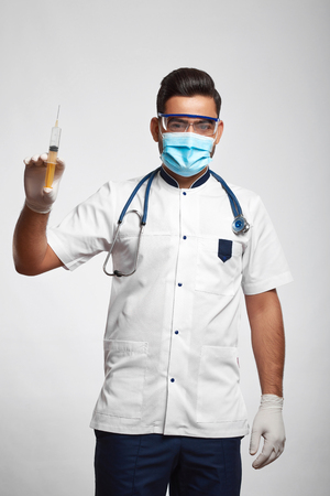 Male doctor posing at studioの写真素材