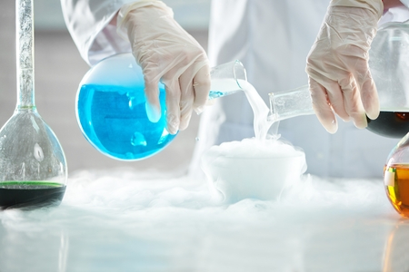 Female chemist working at the laboratoryの写真素材