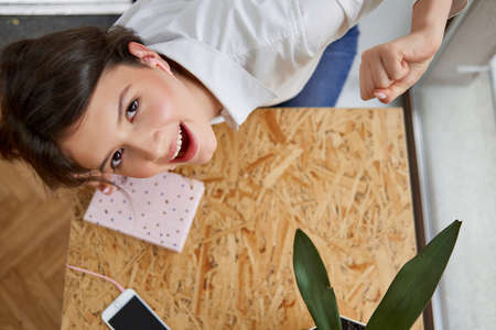 Young female student at the libraryの写真素材