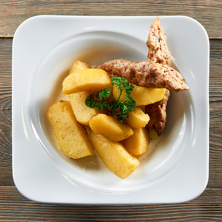 Delicious food on the wooden tableの写真素材