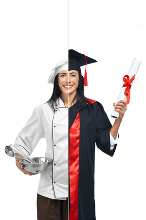 Young woman in two occupations of chef and graduate student isolated on white background. Cook wearing in white coat, holding bowl with tools. Other side graduate wearing mantle and holding diploma.の写真素材