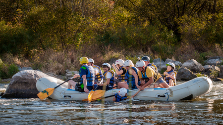 Village Myhiya, Nikolaev region, Ukraine - September 10, 2016: Rafting on the Southern Bug River. An experienced instructor holds the key to a great adventure. Rafting in Ukraine. Fun, risky, bold action.のeditorial素材