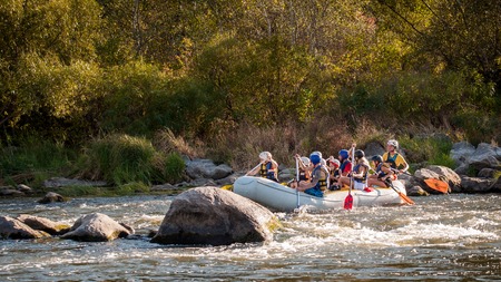 Village Myhiya, Nikolaev region, Ukraine - September 10, 2016: Rafting on the Southern Bug River. An experienced instructor holds the key to a great adventure. Rafting in Ukraine. Fun, risky, bold action.のeditorial素材