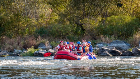 Village Myhiya, Nikolaev region, Ukraine - September 10, 2016: Rafting on the Southern Bug River. An experienced instructor holds the key to a great adventure. Rafting in Ukraine. Fun, risky, bold action.のeditorial素材