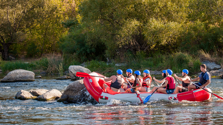 Village Myhiya, Nikolaev region, Ukraine - September 10, 2016: Rafting on the Southern Bug River. An experienced instructor holds the key to a great adventure. Rafting in Ukraine. Fun, risky, bold action.のeditorial素材