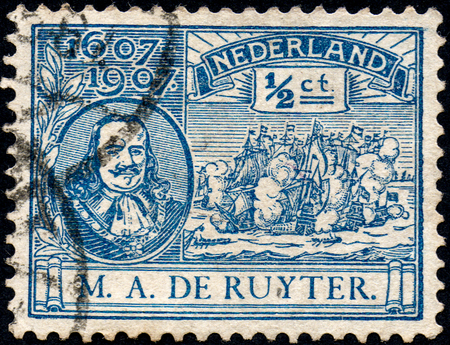 UKRAINE - CIRCA 2017: A stamp printed in Netherlands shows Ruyter and old sailing ship, circa 1907のeditorial素材