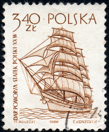 UKRAINE - CIRCA 2017: A stamp printed in Poland shows a historic frigate ship built in 1909, circa 1963のeditorial素材