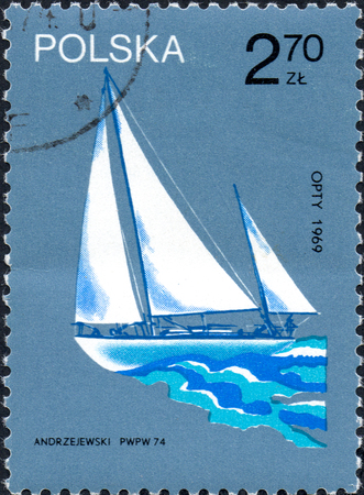 UKRAINE - CIRCA 2017: A stamp printed in Poland shows old sailing yacht opty 1969, circa 1974のeditorial素材