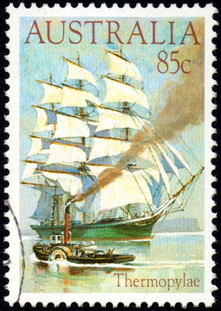 UKRAINE - CIRCA 2017: A stamp printed Australia, shows ship Thermopylae, circa 1984のeditorial素材