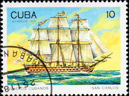 UKRAINE - CIRCA 2017: A postage stamp printed in Cuba shows sailing ship San Carlos, from the series Cuban sailboats, circa 1989のeditorial素材