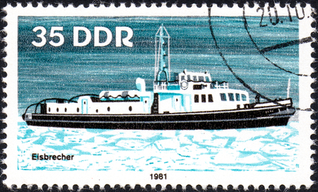 UKRAINE - CIRCA 2017: A postage stamp printed in DDR shows Ice Breaker, River Boat, circa 1981のeditorial素材