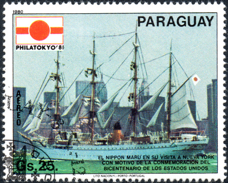 UKRAINE - CIRCA 2017: A postage stamp printed in Paraguai shows ship Nippon Maru, from the series International stamps exhibitions - ship paintings, circa 1980のeditorial素材