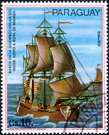 UKRAINE - CIRCA 2017: A postage stamp printed in Paraguai shows sailing ship boat at the mouth of the Weser near Bremen buoy, from the series Paintings German ships, circa 1977のeditorial素材