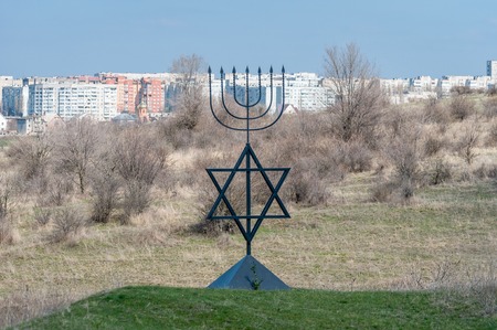 The menorah is a symbol of Judaism, the national-religious sign of Israel. The six-pointed star of...