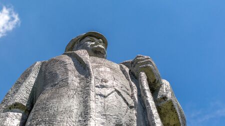 Kremenivka, Ukraine - May 21, 2017: The monument to Vladimir Lenin, the Soviet leader. Stone statue with a view to the sky. Bottom view.のeditorial素材