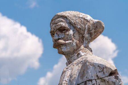 Kremenivka, Ukraine - May 21, 2017: The monument to Chapaev. Stone statue with a view to the sky. Decommunization.のeditorial素材