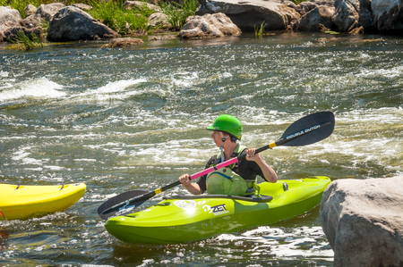 Village Myhiya, Nikolaev region, Ukraine - July 2, 2017: Kayaking on the Southern Bug River in sunny weather. A popular place for extreme recreation and training of rafting and kayaking athletes.のeditorial素材
