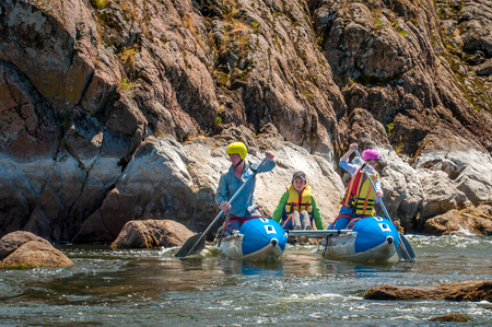Village Myhiya, Nikolaev region, Ukraine - July 2, 2017: Kids and rafting. A popular place for extreme family recreation and training of athletes in rafting and kayaking.のeditorial素材