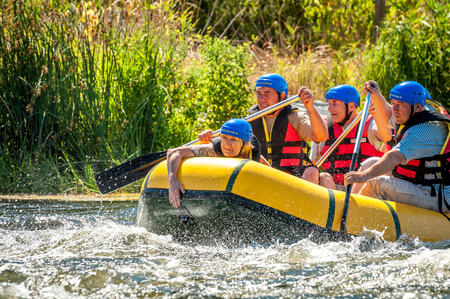 Village Myhiya, Nikolaev region, Ukraine - July 2, 2017: Elderly men and women are engaged in rafting. A popular place for extreme recreation and training of rafting and kayaking athletes.のeditorial素材