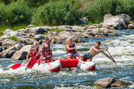 Village Mihia, Mykolayiv region, Ukraine - July 2, 2017: Rafting and kayaking. A popular place for extreme family and corporate recreation as well as training for athletes.のeditorial素材