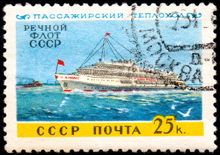 UKRAINE - CIRCA 2017: A postage stamp printed in USSR shows Passenger motor ship and Inscription River Fleet of USSR, from the series Domestic fleet, circa 1960のeditorial素材