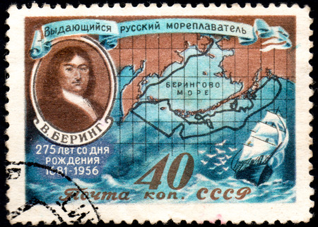 UKRAINE - CIRCA 2017: A postage stamp printed in USSR shows shows portrait of Bering and Routes of his Voyages, circa 1956のeditorial素材
