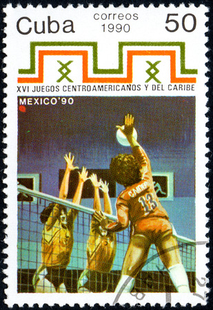 UKRAINE - CIRCA 2017: A postage stamp printed in Cuba shows Volleyball from series 16th Central American and Caribbean Games, circa 1990のeditorial素材