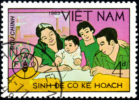 UKRAINE - CIRCA 2017: A postage stamp printed in Vietnam shows Family from series World Food Day, circa 1983のeditorial素材