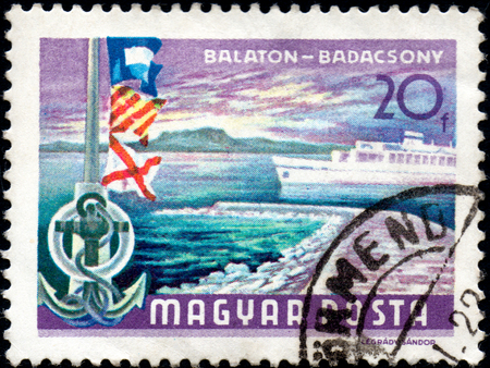 UKRAINE - CIRCA 2017: A postage stamp printed in Hungary shows Lake Balaton at Badacsony, circa 1968のeditorial素材
