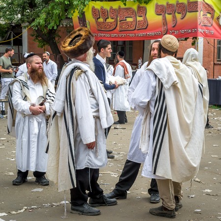 Uman, Ukraine - 21 September 2017: Rosh Hashanah, Jewish New Year 5778. It is celebrated near the grave of Rabbi Nachman. Pilgrims of the Hasidim on the street of the city of Uman.のeditorial素材