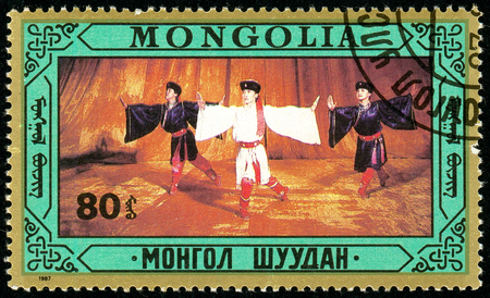 Ukraine - circa 2018: A postage stamp printed in Mongolia shows Folk dances. Series: Folklore. Circa 1976.のeditorial素材