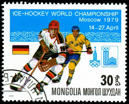 Ukraine - circa 2018: A postage stamp printed in Mongolia show hockey. A players in the uniform of Germany and Sweden. Flag Germany. Series: Moscow ice hockey world championships. Circa 1979.