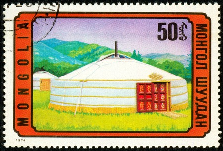 Ukraine - circa 2018: A postage stamp printed in Mongolia show Mongolian jurte. Series: Mongolian Architecture. Circa 1974.のeditorial素材