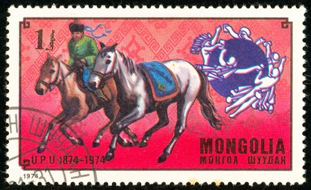 Ukraine - circa 2018: A postage stamp printed in Mongolia show Mongolian post rider. Series: U.P.U. Universal Postal Union, Centenary. Circa 1974.のeditorial素材