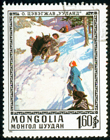 Ukraine - circa 2018: A postage stamp printed in Mongolia show Yak Descending in Snow. Series: Paintings by O. Cevegshava. Circa 1976.のeditorial素材