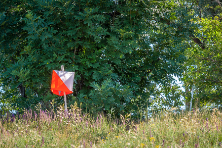 Orienteering. Check point Prism and composter for orienteering. Navigation equipment. The conceptの写真素材